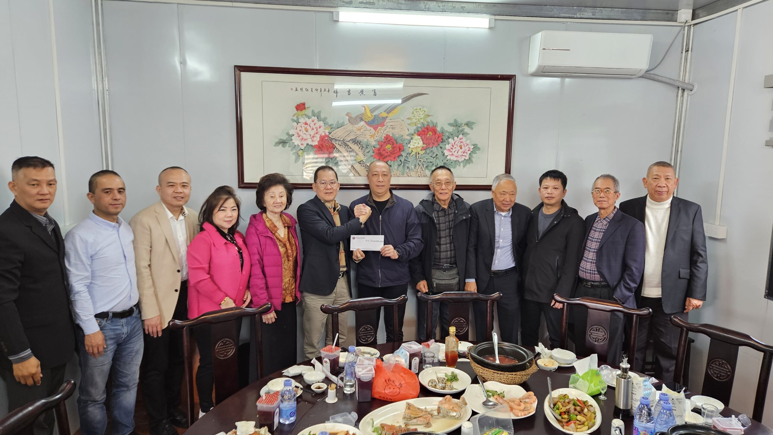 本会一行与晋江市英林镇党委书记李德铭合影